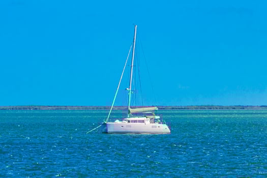 Luxury travel with yacht on Holbox island turquoise water Mexico. photo