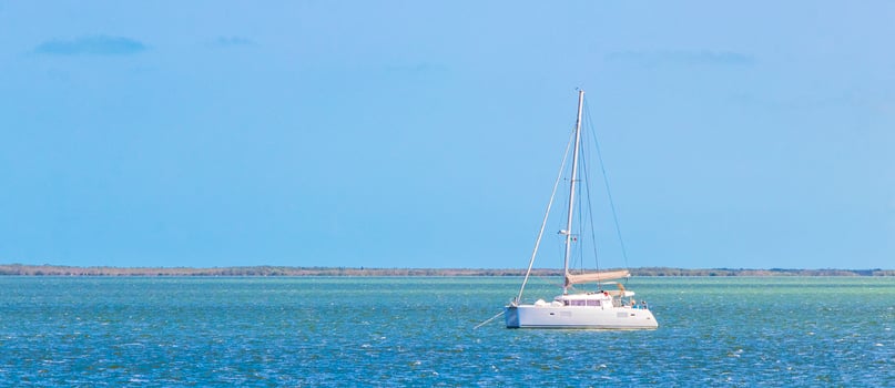 Luxury travel with yacht on Holbox island turquoise water Mexico. photo