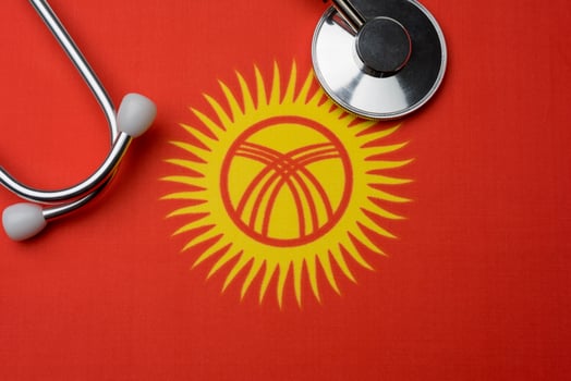 Flag of Kyrgyzstan and stethoscope. The concept of medicine. photo