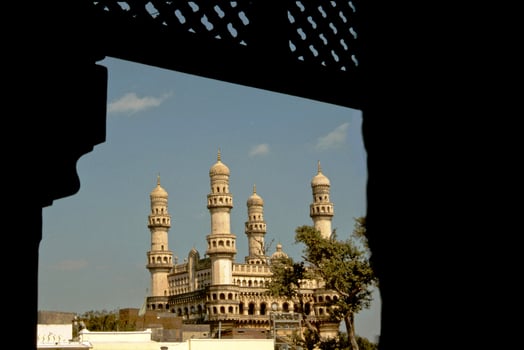 Char Minar framed in silhouette photo