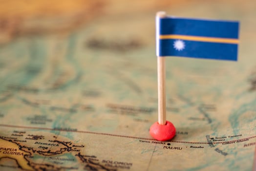 the flag of Nauru on the world map. photo