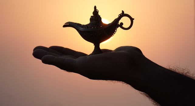 aladdin magic lamp in sky with sun photo