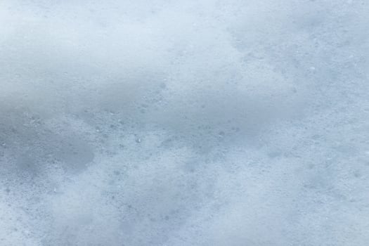 White foam bubble from soap or shampoo washing texture background. photo