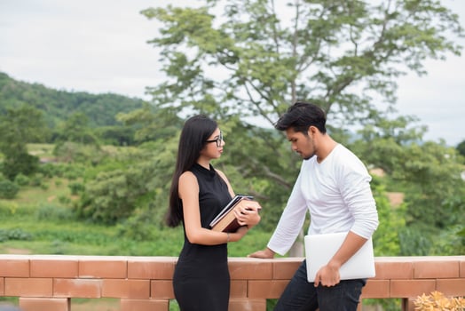 Young education couple talking about education after reading book,Relaxing with nature. photo