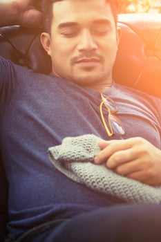 handsome hipster man take a nap on his sofa in the house photo