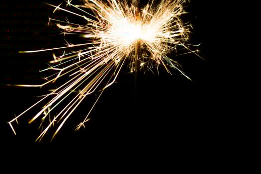 Christmas and newyear party sparkler on black photo