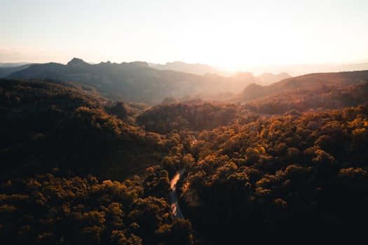 Mountains and sunset light in the evening at a rural village photo