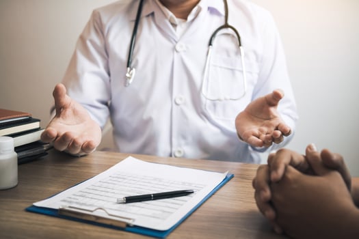 Doctor talking to the patient about menopause and treatment in future. photo