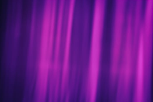 Softly blurred rays of magenta color on a dark purple background. Abstraction curtain. photo