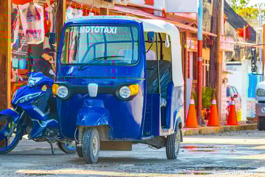 Blue auto rickshaw tuk tuk Puerto de Chiquila in Mexico. photo