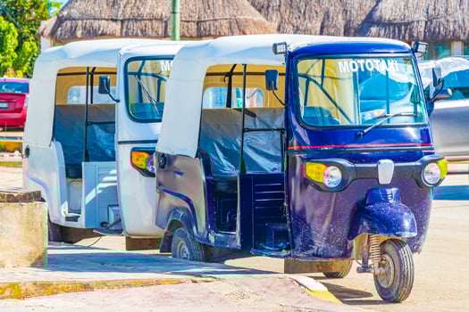Blue white auto rickshaw tuk tuk Puerto de Chiquila Mexico. photo