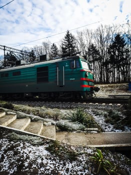 Winter train travels on its way photo