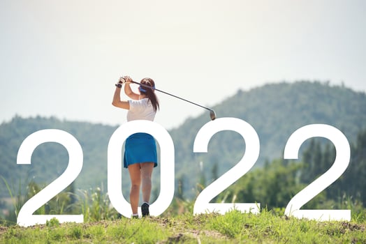 Woman golfer finished golf swing. Beginning and start of the new year 2022, goals and plans for the next year photo