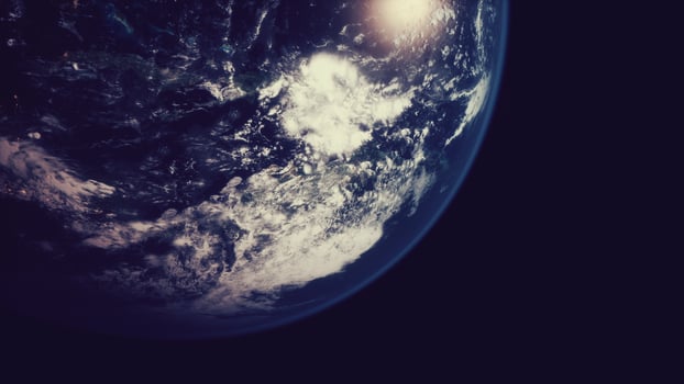 Earth planet viewed from space at night showing the lights of countries photo