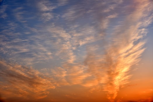 Beautiful rose blue evening sunset with clouds photo