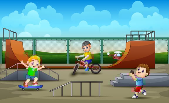 Happy boys having fun on the skate park vector