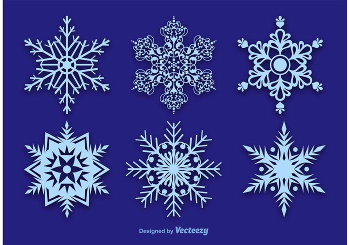 Copos de nieve decoraciones vectoriales vector