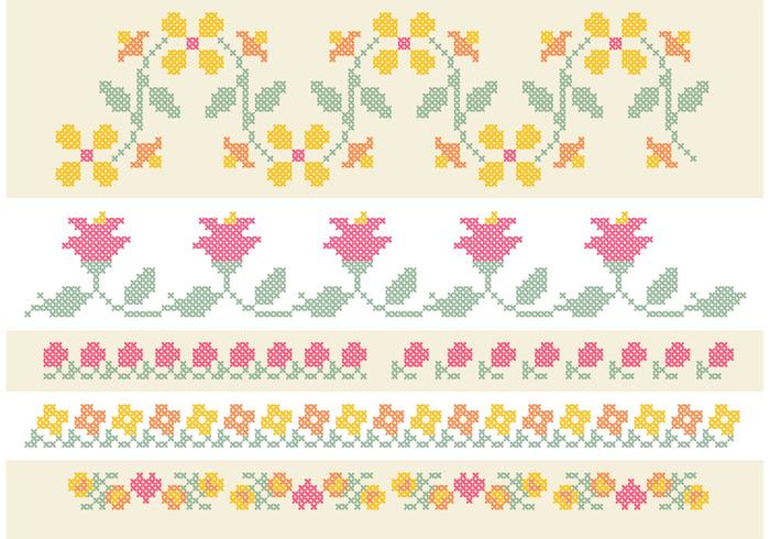 Conjunto de bordes de flores de puntada cruzada vector