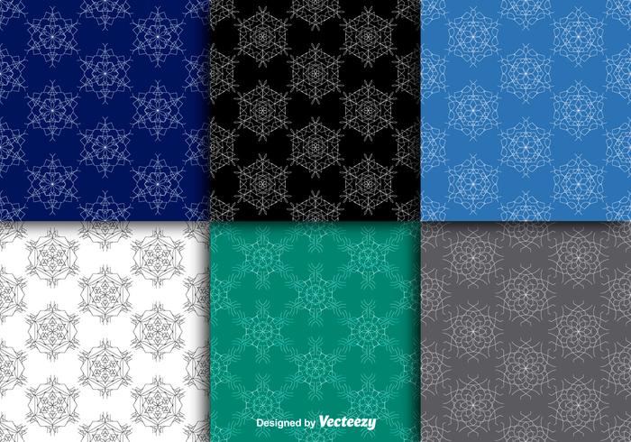 Snowflakes seamless patterns vector