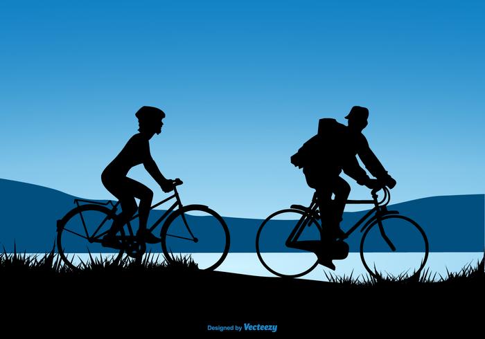 Silhouette Design Of A Couple Riding Bicycles