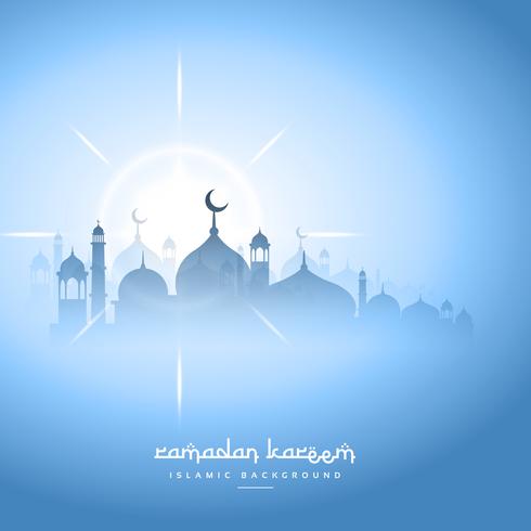 Blue sky ramadan kareem background with mosque silhouette 