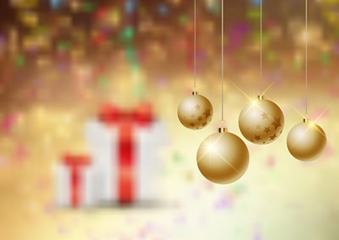 Christmas baubles on a defocussed background vector