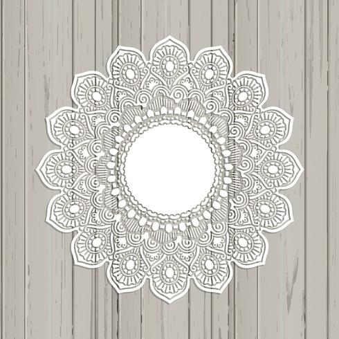Lace style mandala on a wooden background vector