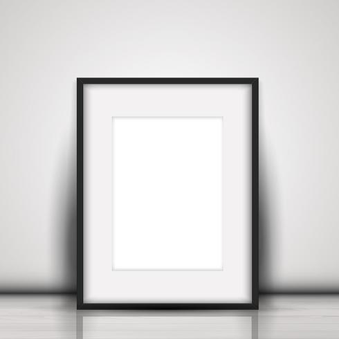 Blank picture leaning against a white wall vector