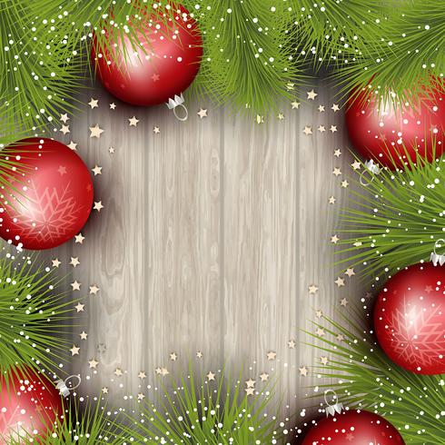 Christmas background with pine tree branches and baubles vector