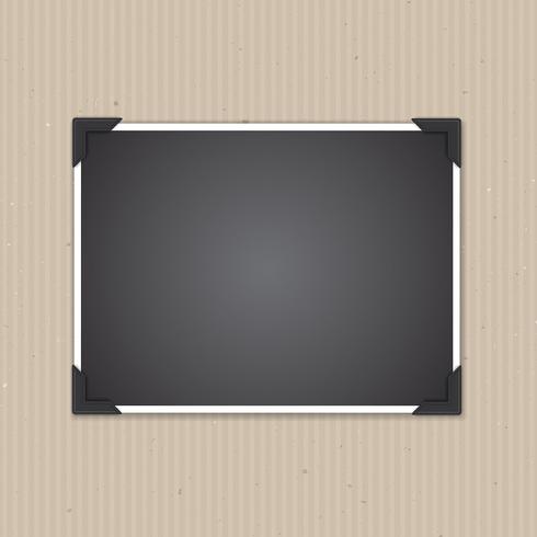 Blank photo frame on cardboard texture  vector