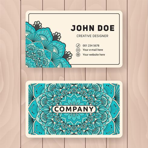 Creative useful business name card design. Vintage colored Manda vector