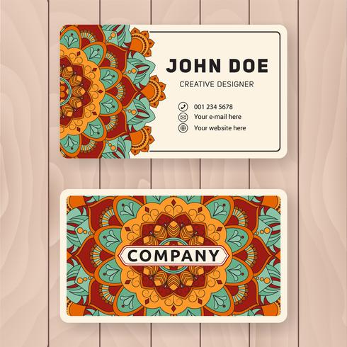 Creative useful business name card design. Vintage colored Manda vector