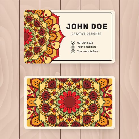 Creative useful business name card design. Vintage colored Manda vector