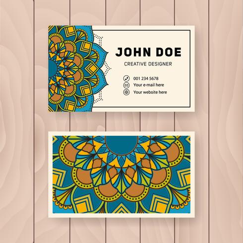 Creative useful business name card design. Vintage colored Manda vector