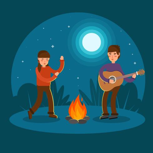 Young Couple Playing Guitar and Dancing at Campfire