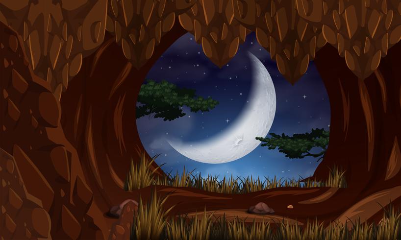 Cueva de noche con escena lunar. vector