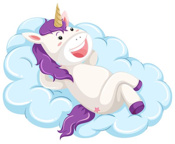 Un unicornio yacía en una nube. vector