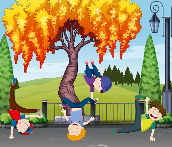 Four kids dancing in the park vector