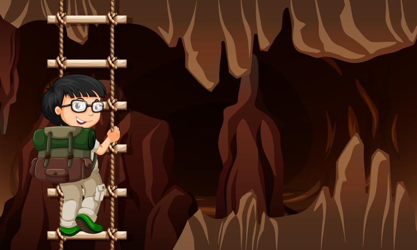 A man climbing ladder in cave vector