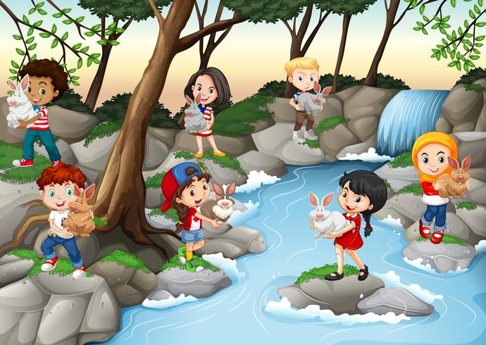 Niños divirtiéndose en la cascada. vector