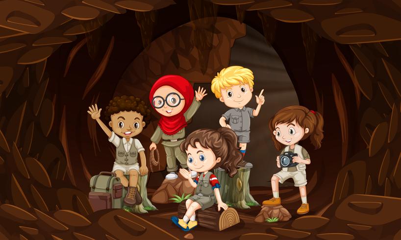 A group of interational kids in cave vector