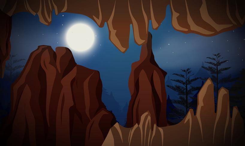 Cave at night scene vector