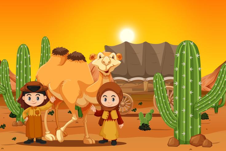 dos niños con camello en el desierto vector