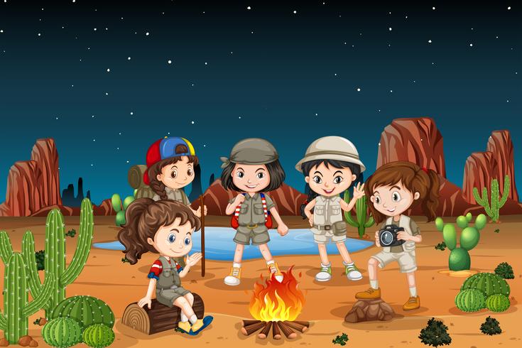 Group of children camping in the desert vector