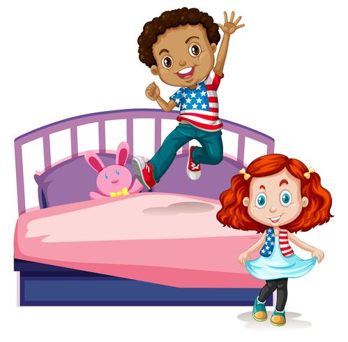 Niño y niña saltando en la cama vector