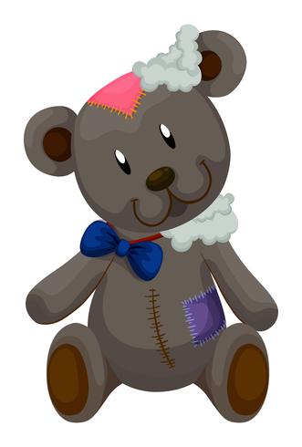 Old teddy bear with patches vector