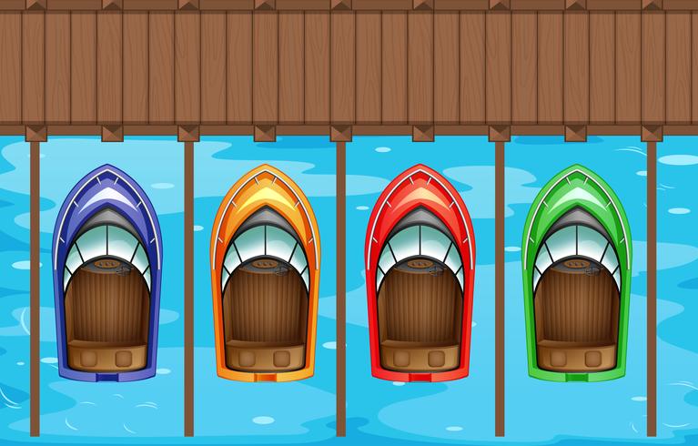 Four boats parking at the pier vector