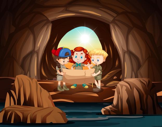 Un grupo de exploradores aventurados en la cueva. vector