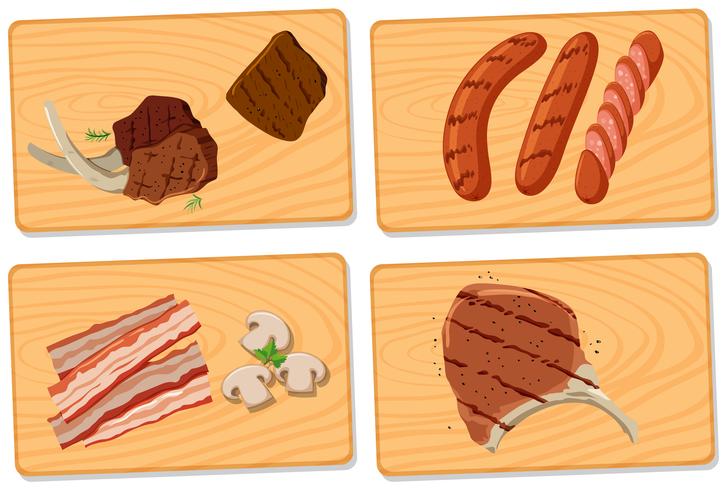 Variedad de carnes sobre tablas de picar. vector