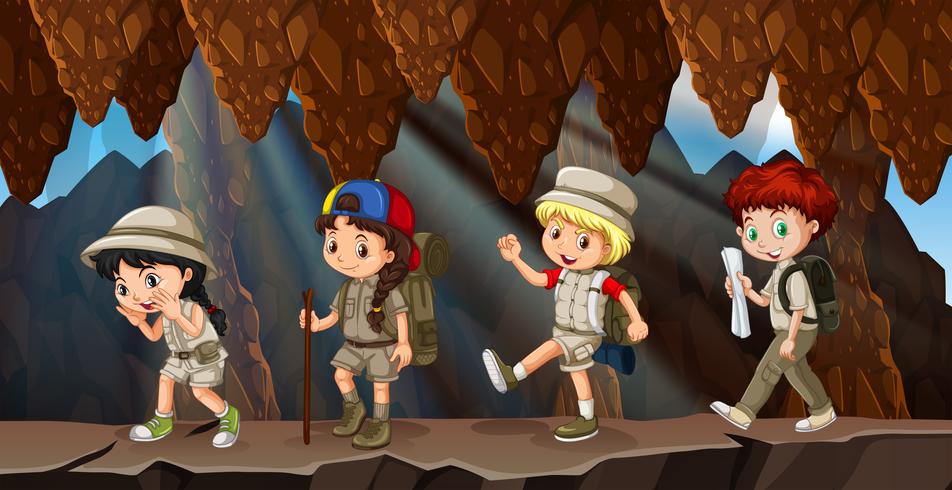 A group of kids hiking in cave vector